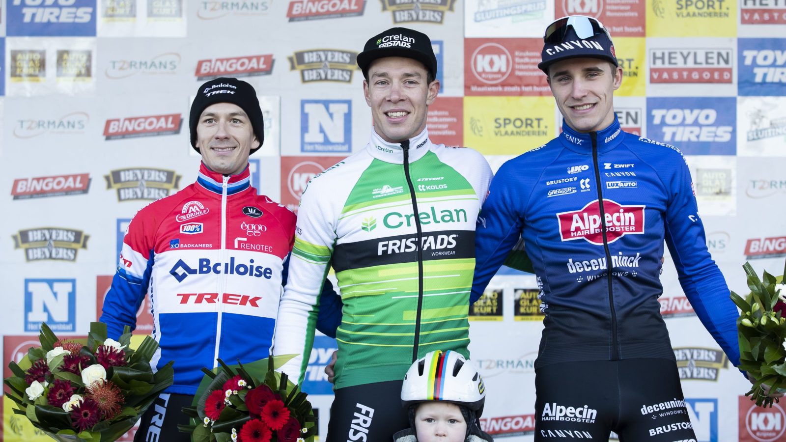 Dutch Lars Van Der Haar, Belgian Laurens Sweeck and his son Mathis and Belgian Niels Vandeputte pictured on the podium after the men's elite race at the 'Internationale Sluitingsprijs Oostmalle' cyclocross race, Sunday 26 February 2023, in Oostmalle, the last race of the 2022-2023 season. BELGA PHOTO KRISTOF VAN ACCOM